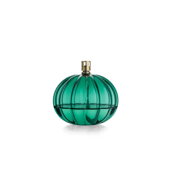 Aurora oljelampe 11 cm i teal fra Hadeland Glassverk – munnblåst rund lampe med optisk struktur og elegant blågrønn glød.