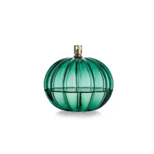 1248114_Aurora_optikk_rund_teal_14cm Aurora oljelampe 14 cm i teal fra Hadeland Glassverk – munnblåst rund lampe med optisk struktur og dyp blågrønn farge.