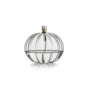 Aurora oljelampe 14 cm i klart glass fra Hadeland Glassverk – munnblåst rund lampe med vakker optisk struktur og tidløst design.