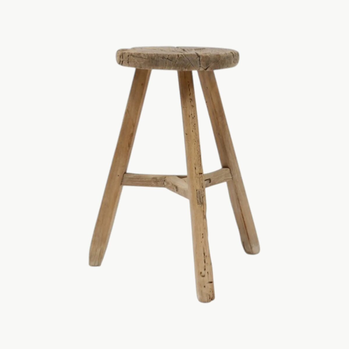 Rund vintage krakk i massivt tre med naturlig patina og tre ben